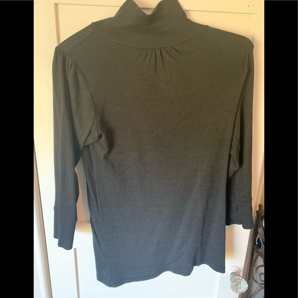 Michael stars black turtle neck